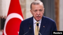 FILE - Turkey's President Recep Tayyip Erdogan speaks during a joint statement to the media in Baghdad, Iraq, April 22, 2024. 