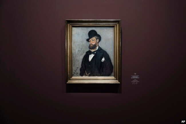 A portrait of Leon Monet by his brother Claude Monet hangs on display as part of an exhibition illuminating the hitherto unknown role Leon played in the role of his brother Claude's life and art, at the Musée du Luxembourg in Paris, Monday, March 13, 2023. (AP Photo/Lewis Joly)