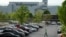 A person walks across the parking lot at the Volkswagen automobile plant in Chattanooga, Tennessee, April 19, 2024. Workers at the plant voted late that day to join the United Auto Workers union.