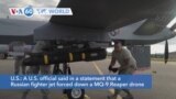 VOA60 World - Russian fighter forced down U.S. drone, U.S. officials said