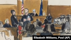 On April 18, 2024, in the Manhattan Criminal Court in New York City, former President Donald Trump, seated on the far left, watched the jury members answer questions before Judge Juan Merchan. questions in the group survey questionnaire.