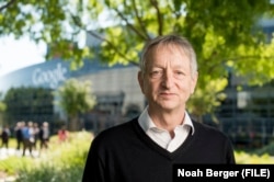 FILE - AI scientist Geoffrey Hinton poses at Google's Mountain View, Calif, headquarters on March 25, 2015. Hinton prefers a term for AGI — superintelligence — "for AGIs that are better than humans." (AP Photo/Noah Berger, File)