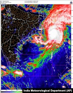 This satellite image provided by India Meteorological Department shows storm Mocha intensify into a severe cyclonic storm, May 14, 2023.