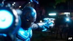 This image released by Warner Bros. Pictures shows Xolo Mariduena in a scene from "Blue Beetle."