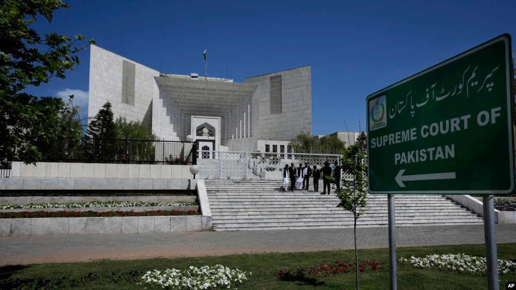 FILE - Lawyers are seen gathered outside Pakistan's Supreme Court in Islamabad, April 4, 2023. Pakistan’s government amended the country's constitution on Oct. 21, 2024, authorizing parliament to select the Supreme Court chief justice.