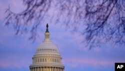 FILE - Light reflects off of the U.S. Capitol dome on Capitol Hill in Washington, Jan. 4, 2023. 