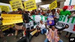 Protesters gather to demand action on climate change, in the streets of downtown Nairobi, Kenya, Sept. 4, 2023, as the Africa Climate Summit begins. 
