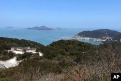 A view of Matsu Islands is seen from an observation deck on Nangan, part of Matsu Islands, Taiwan on Tuesday, March 7, 2023. (AP Photo/Johnson Lai)