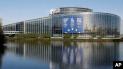 FILE - A giant canvas promoting the European elections is seen on the European Parliament on April 11, 2024 in Strasbourg, eastern France.