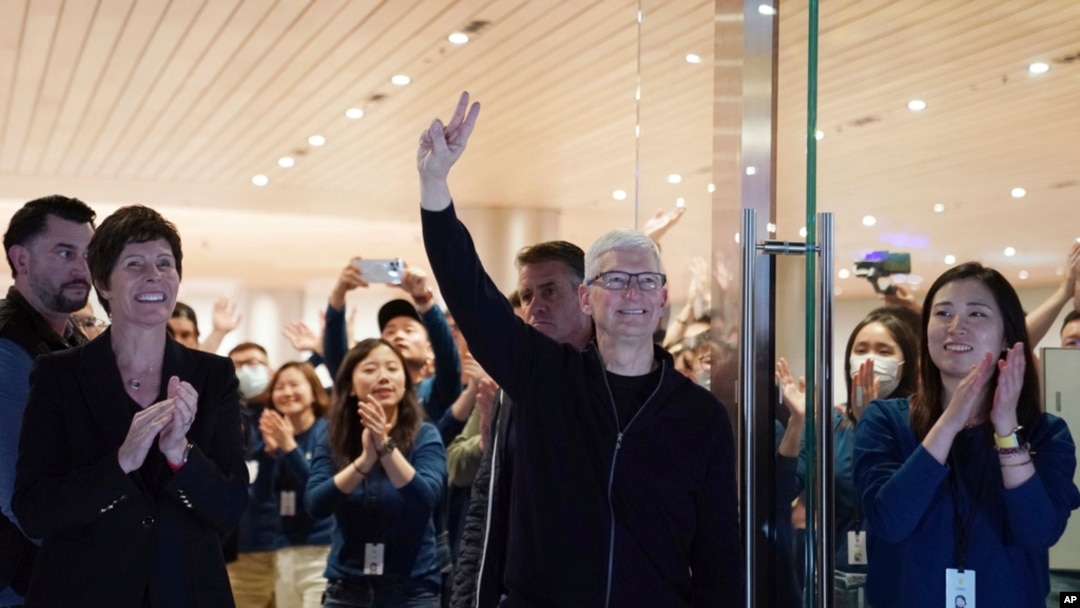 Apple CEO Tim Cook attends the opening of a new flagship Apple store in Shanghai, China, March 21, 2024, in this photo provided by China's Xinhua News Agency.