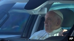 Pope Francis arrives to board his flight to Budapest at Rome's international airport in Fiumicino, Italy, April 28, 2023. 