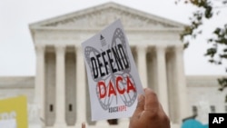 FILE - People rally outside the U.S. Supreme Court in Washington over former President Donald Trump's decision to end the Deferred Action for Childhood Arrivals program, Nov. 12, 2019. DACA's future remains in limbo with a court hearing set for Oct. 10, 2024.