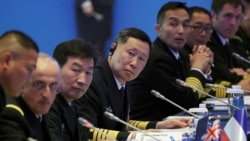 Tư lệnh Hải quân Quân đội Giải phóng Nhân dân Trung Quốc (PLA), Đô đốc Hồ Trung Minh tham dự Hội nghị chuyên đề Hải quân Tây Thái Bình Dương tại Thanh Đảo, tỉnh Sơn Đông, ngày 22/4.