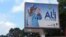 FILE - A defaced billboard of Gabon President Ali Bongo Ondimba is seen on an empty street in Libreville, Gabon, Wednesday Aug. 30, 2023. 