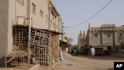 The streets of old town Djenne, Mali, once filled with tourists, stand empty, May 9, 2024.