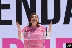 Mexican presidential candidate Xochitl Galvez speaks at an opposition rally to encourage voting ahead of the June 2 presidential elections, in the main square, Mexico City, May 19, 2024.