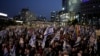 Thousands of Israelis stage anti-government protests calling for new elections