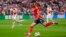 FILE - Spain's Mikel Merino shoots during a Group B match between Spain and Croatia at the Euro 2024 soccer tournament in Berlin, Germany, June 15, 2024. Spain defeated Croatia 3-0. Spain plays Germany in the quarterfinals on Friday.