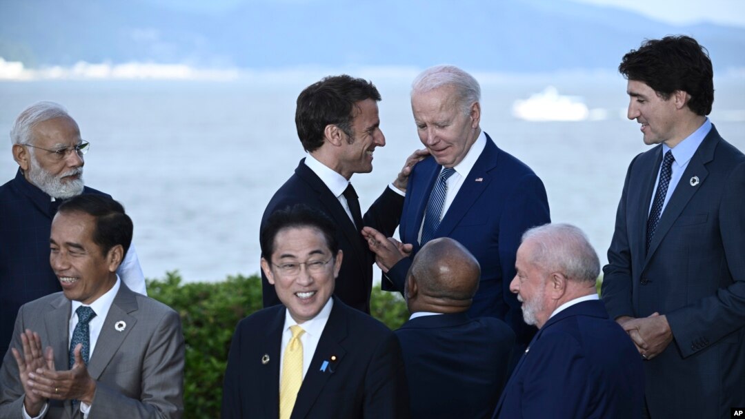 France's President Emmanuel Macron, top center left, with US President Joe Biden at the G7 Leaders' Summit in Hiroshima, western Japan, May 20, 2023.