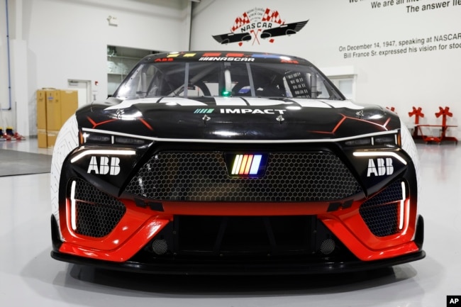 A prototype of the first electric racecar is displayed at the NASCAR R&D Center in Concord, N.C., Monday, July 1, 2024. (AP Photo/Nell Redmond)