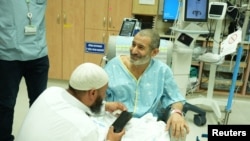 Qaid Farhan Alkadi, a Bedouin Israeli hostage kidnapped in the October 7 Hamas attack, is reunited with a loved one, at Soroka Medical Center in Beersheba, Israel, Aug. 27, 2024. (Government Press Office/Yossi Ifergan/Handout via Reuters)