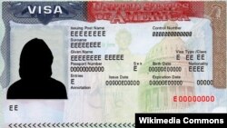 FILE: Illustration of a sample U.S. Visa card. Uploaded March 31, 2023. 