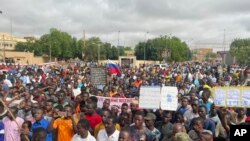 FILE - Supporters of Niger's ruling junta, gather for a protest called to fight for the country's freedom and push back against foreign interference, in Niamey, Niger on Thursday, Aug. 3, 2023. 
