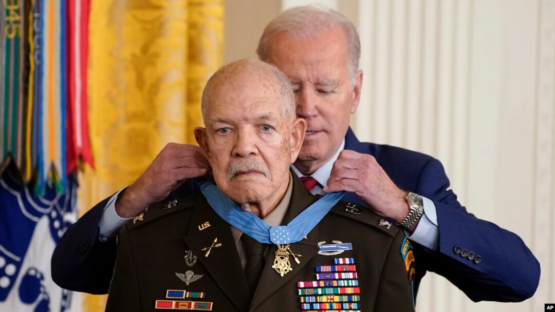 President Joe Biden awards the Medal of Honor to retired Army Col. Paris Davis for his heroism during the Vietnam War, in the East Room of the White House, March 3, 2023, in Washington.