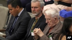 Yaroslav Hunka, right, sits in Canada's House of Commons in Ottawa, Ontario, Sept. 22, 2023. (Patrick Doyle/The Canadian Press via AP)