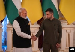 Indian Prime Minister Narendra Modi, left, meets with Ukrainian President Volodymyr Zelenskyy in Kyiv, Ukraine, Aug. 23, 2024.