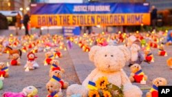 Avaaz members and Ukrainian refugees install thousands of teddy bears and toys at Schuman Roundabout in front of the European Commission to highlight the reported abduction of thousands of Ukrainian children by Russia on Thursday Feb,23, 2022 in Brussels.