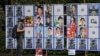 A person looks at an election poster board for the Tokyo gubernatorial election July 1, 2024, in Tokyo. 