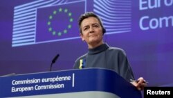FILE - European Commissioner Margrethe Vestager pauses at a press conference in Brussels, Belgium, March 5, 2024.