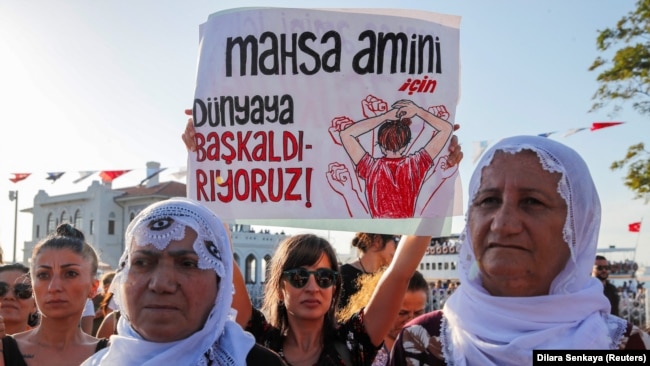 Women take part in a rally on the first anniversary of the death of Mahsa Amini, which prompted protests across the country, in Istanbul, Turkey, Sept. 16, 2023.