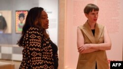 Zinga Fraser, left, and Sarah Seidman, co-curators of the "Changing the Face of Democracy: Shirley Chisholm at 100" exhibition, speak at the Museum of the City of New York, New York, June 11, 2024.