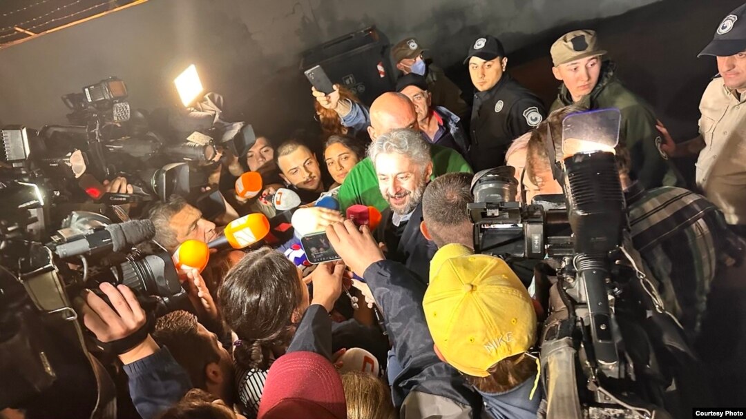 Georgian journalist Nika Gvaramia walks free from prison in Rustavi, Georgia, after a presidential pardon was issued on June 22, 2023. (Sofia Liluashvili)