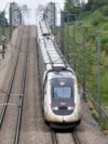 A high-speed train by French railway company SNCF travels on the Bordeaux-Paris route at reduced speed, at Chartres, northern France on July 26, 2024.