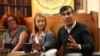 British Prime Minister Rishi Sunak and Katy Bourne, Sussex police and crime commissioner, second left, meet with Neighbourhood Watch representatives in Horsham, south of London, June 10, 2024, ahead of a campaign event for the July 4 election. (Pool/AP)