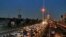 FILE - Cars wait in traffic on a highway with a view of the Milad Tower in Tehran, March 12, 2023. Highway deaths that occur over the Persian new year holiday have been blamed on poor roads, careless driving and poor vehicle quality. 