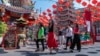 FILE - Chinese tourists visit Pung Tao Gong Chinese Temple in Chiang Mai province, northern Thailand, Jan. 23, 2023. 