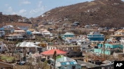 FILE - Hurricane Beryl pummeled buildings in Clifton, Union Island, St. Vincent and the Grenadines, July 4, 2024. Beryl also tore up houses and stripped trees in Mayreau, one of the smallest inhabited islands of St. Vincent and the Grenadines.