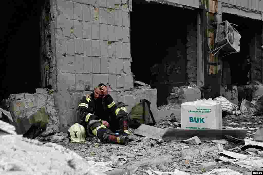 A rescuer pauses from his work at Okhmatdyt children&#39;s hospital after it was damaged during Russian missile strikes in Kyiv, Ukraine, July 8, 2024.