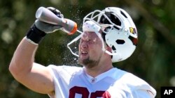 Arizona Cardinals' Ben Stille cools down during an NFL football organized team activity, in Tempe, Arizona, June 5, 2024.