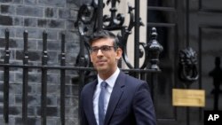 Britain's Prime Minister Rishi Sunak leaves 10 Downing Street for the House of Commons for his weekly Prime Ministers Question's in London, March 15, 2023.