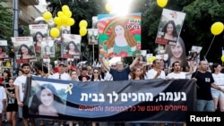 
Family, friends, and supporters of Israeli hostage Naama Levy, who was kidnapped during the deadly October 7 attack, protest on her 20th birthday, in Tel Aviv, Israel, June 22, 2024. 