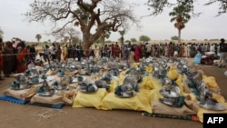 (FILE) Aid kits destined to Sudanese refugees who crossed into Chad are prepared for distribution in Koufroun, near Echbara, on May 1, 2023.