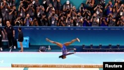 Simone Biles of United States competes on the balance beam during the Women's All-Around Final if Artistic Gymnastics in the 2024 Summer Olympics in Paris, France, Aug.1, 2024.