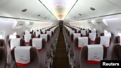 FILE - A view of the interior of a COMAC C919 plane displayed at the Singapore Airshow at Changi Exhibition Center in Singapore, Feb. 21, 2024.