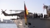 资料照：德国海军护卫舰巴伐利亚号停靠在东京国际邮轮码头期间，时任日本防务大臣岸信夫登舰参观。(2021年11月5日)