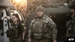 A lightly wounded Ukrainian serviceman arrives at an evacuation point near the front line at Bakhmut, March 23, 2023.